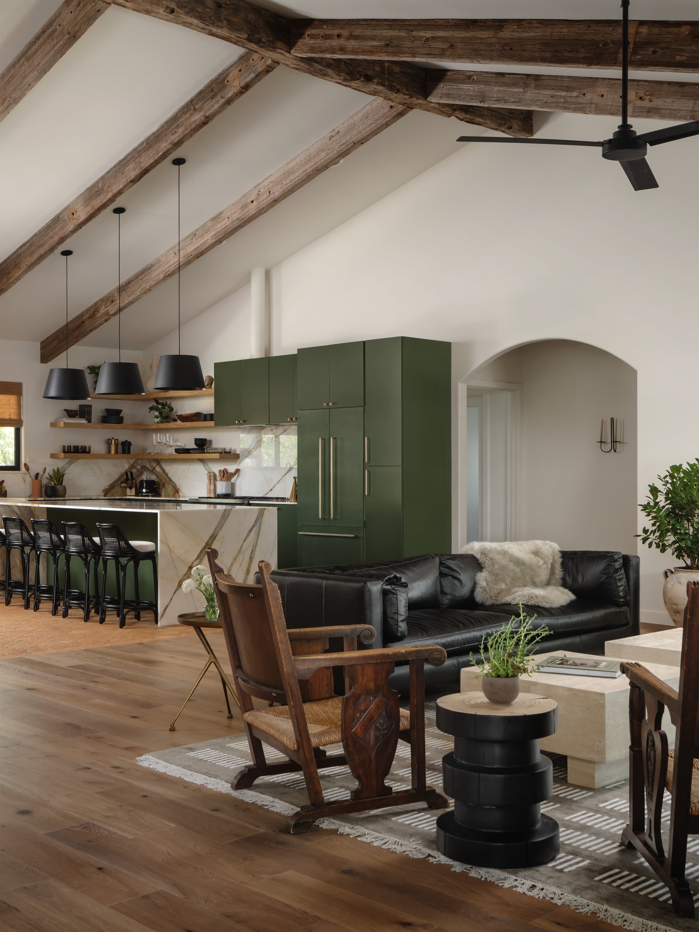Living room leather chairs and abstract art at Casa Alegre Fredericksburg Texas